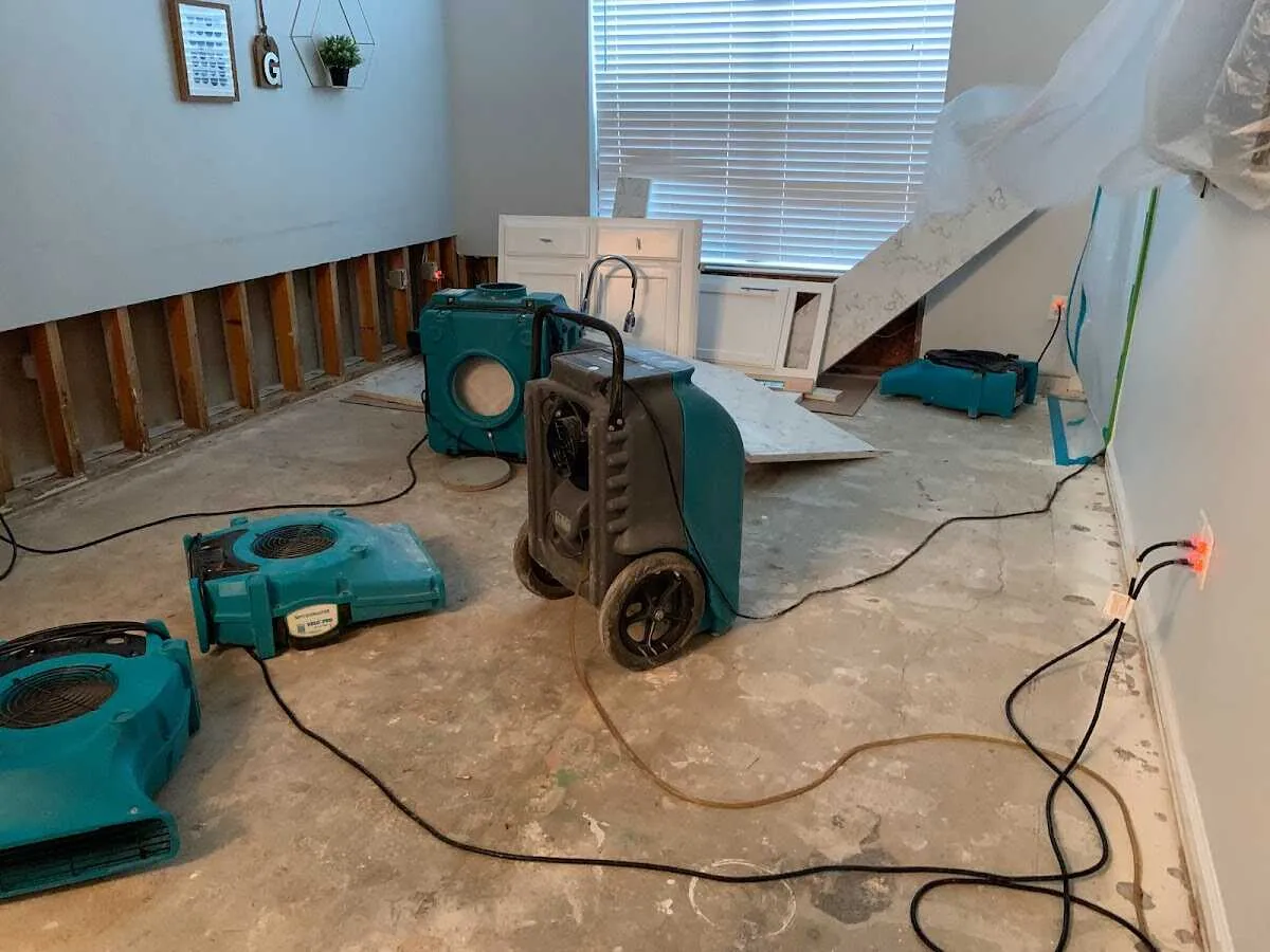 Dehumidifier in flood-cut room for Water Damage Restoration in Courtland